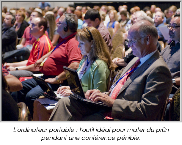 L'ordinateur portable : l'outil idéal pour mater du pr0n pendant une conférence pénible.