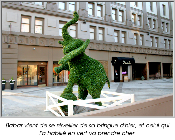 Babar vient de se réveiller de sa bringue d'hier, et celui qui l'a habillé en vert va prendre cher.